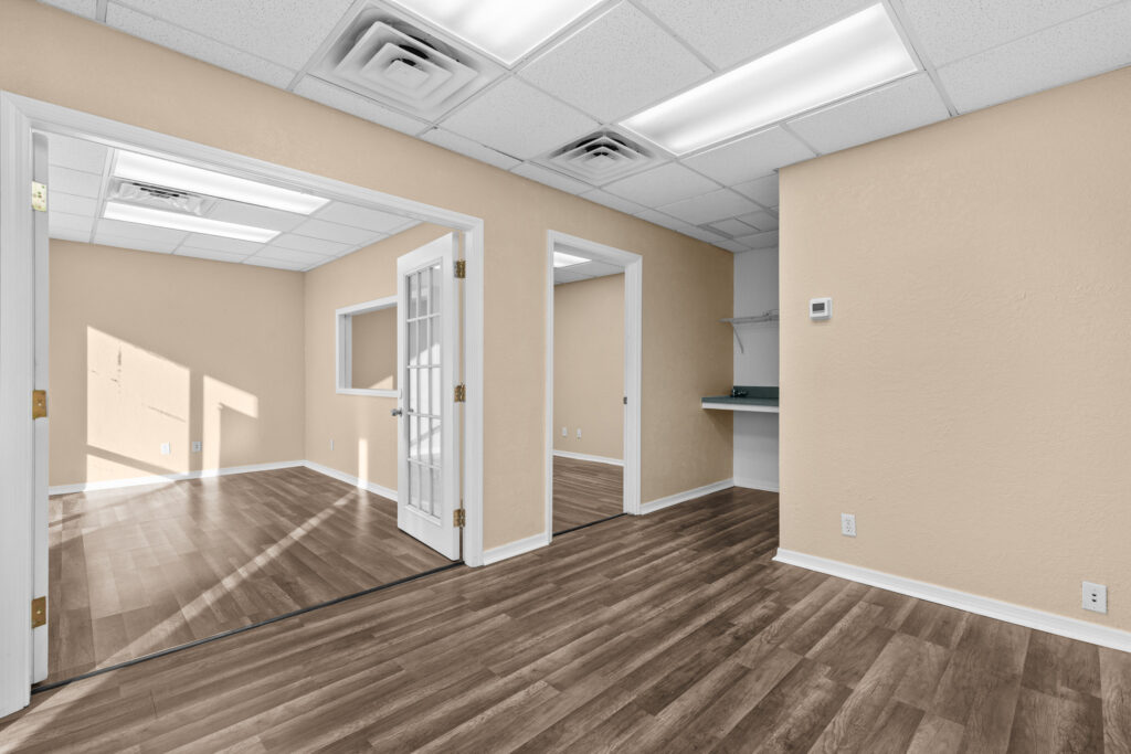 Photo of a commercial space for rent in Merritt Island, Florida at 2460 North Courtenay Parkway in 103 in Merritt Island, Florida. Call Perrone Properties at 321-454-3393 for more information unit 103 at Perrone Plaza.