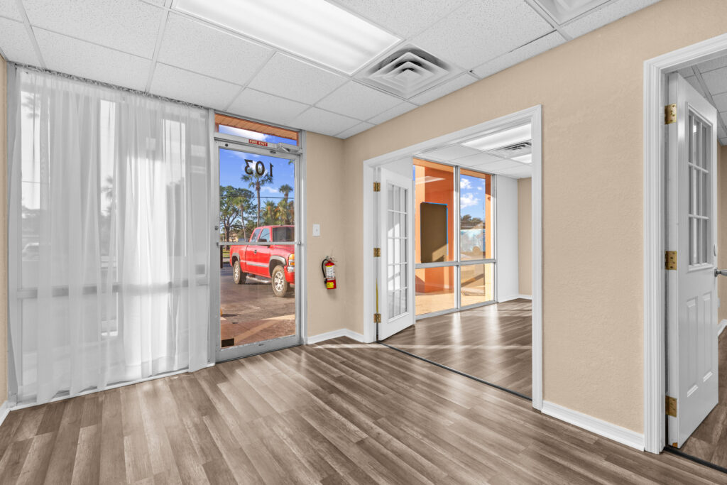 Photo of a commercial space for rent in Merritt Island, Florida at 2460 North Courtenay Parkway in 103 in Merritt Island, Florida. Call Perrone Properties at 321-454-3393 for more information unit 103 at Perrone Plaza.