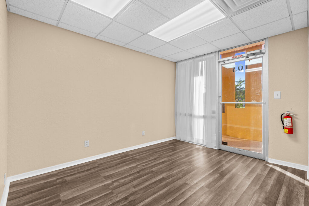 Photo of a commercial space for rent in Merritt Island, Florida at 2460 North Courtenay Parkway in 103 in Merritt Island, Florida. Call Perrone Properties at 321-454-3393 for more information unit 103 at Perrone Plaza.
