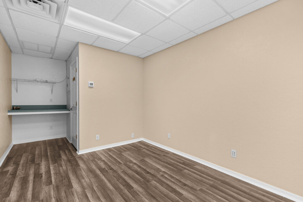 Photo of a commercial space for rent in Merritt Island, Florida at 2460 North Courtenay Parkway in 103 in Merritt Island, Florida. Call Perrone Properties at 321-454-3393 for more information unit 103 at Perrone Plaza.