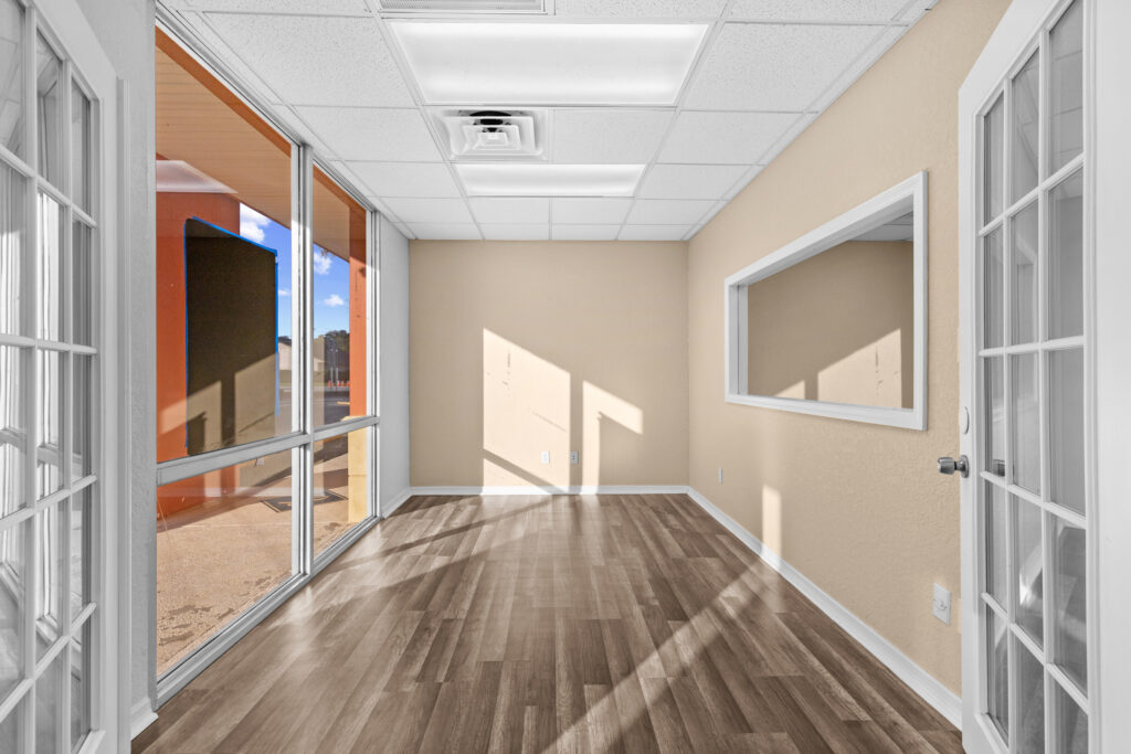 Photo of a commercial space for rent in Merritt Island, Florida at 2460 North Courtenay Parkway in 103 in Merritt Island, Florida. Call Perrone Properties at 321-454-3393 for more information unit 103 at Perrone Plaza.
