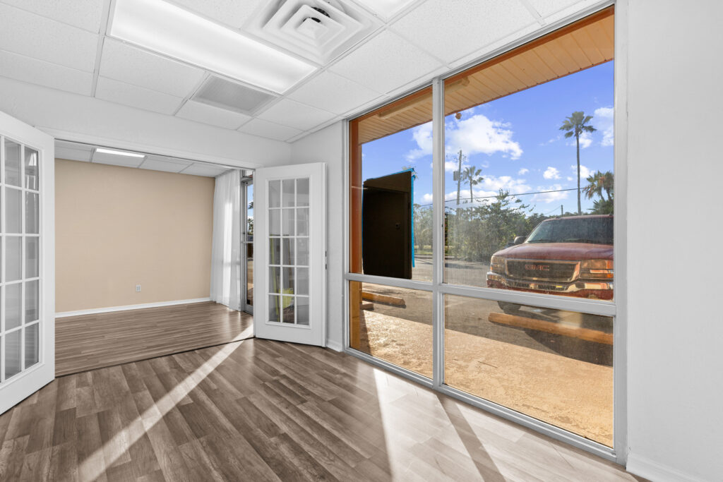 Photo of a commercial space for rent in Merritt Island, Florida at 2460 North Courtenay Parkway in 103 in Merritt Island, Florida. Call Perrone Properties at 321-454-3393 for more information unit 103 at Perrone Plaza.