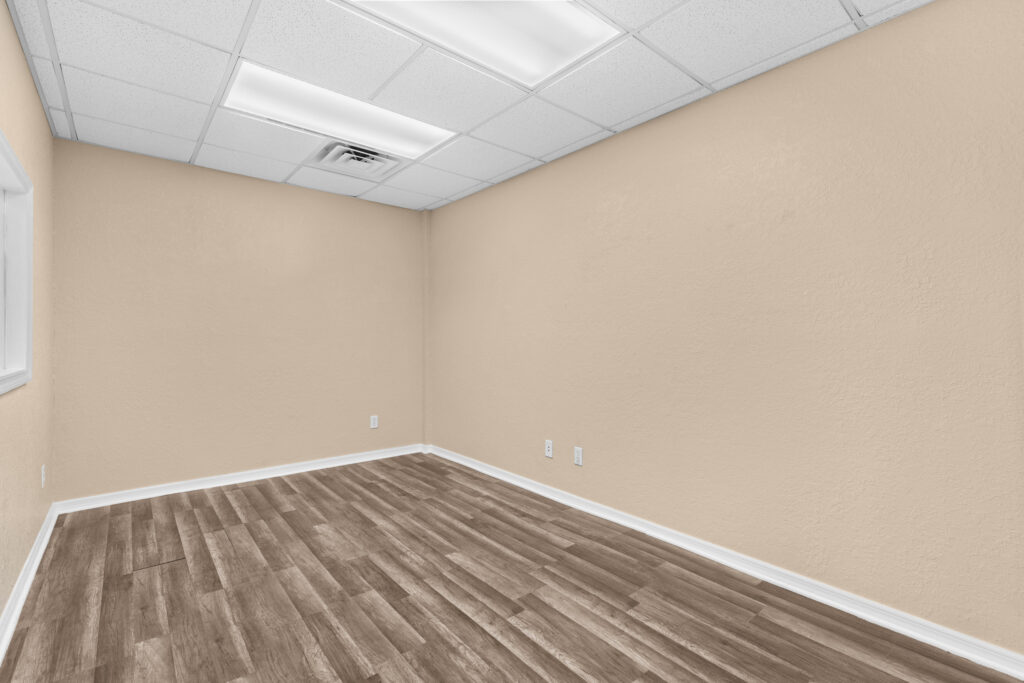 Photo of a commercial space for rent in Merritt Island, Florida at 2460 North Courtenay Parkway in 103 in Merritt Island, Florida. Call Perrone Properties at 321-454-3393 for more information unit 103 at Perrone Plaza.