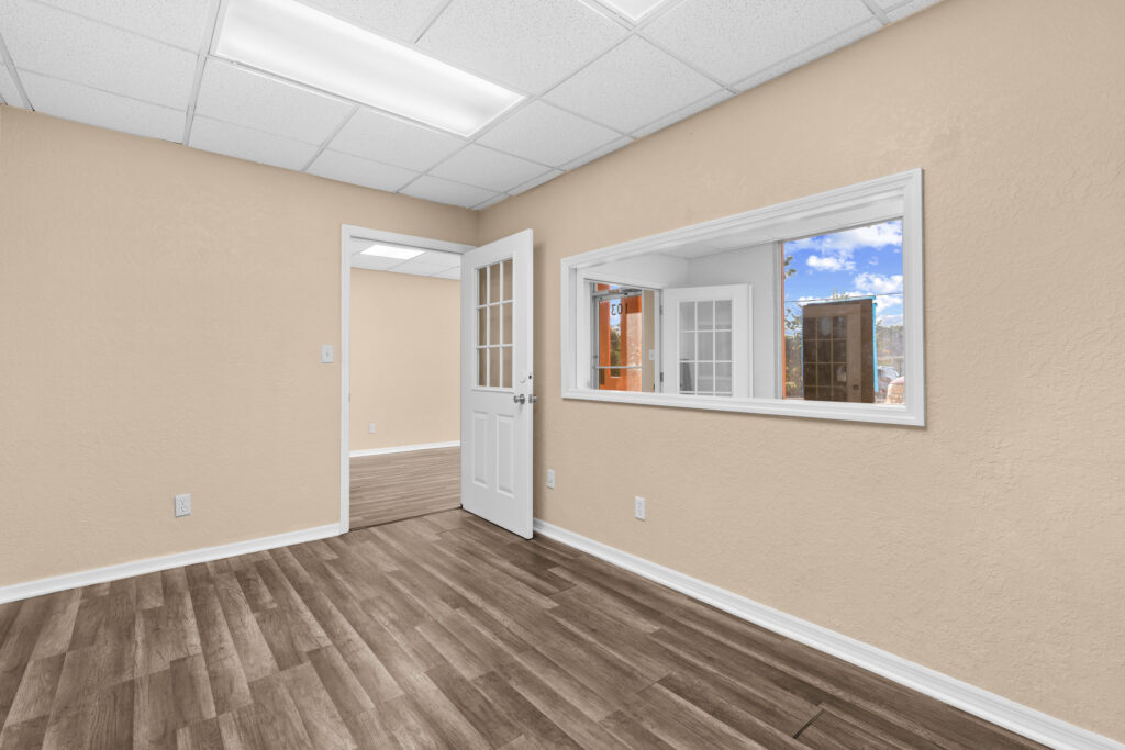 Photo of a commercial space for rent in Merritt Island, Florida at 2460 North Courtenay Parkway in 103 in Merritt Island, Florida. Call Perrone Properties at 321-454-3393 for more information unit 103 at Perrone Plaza.