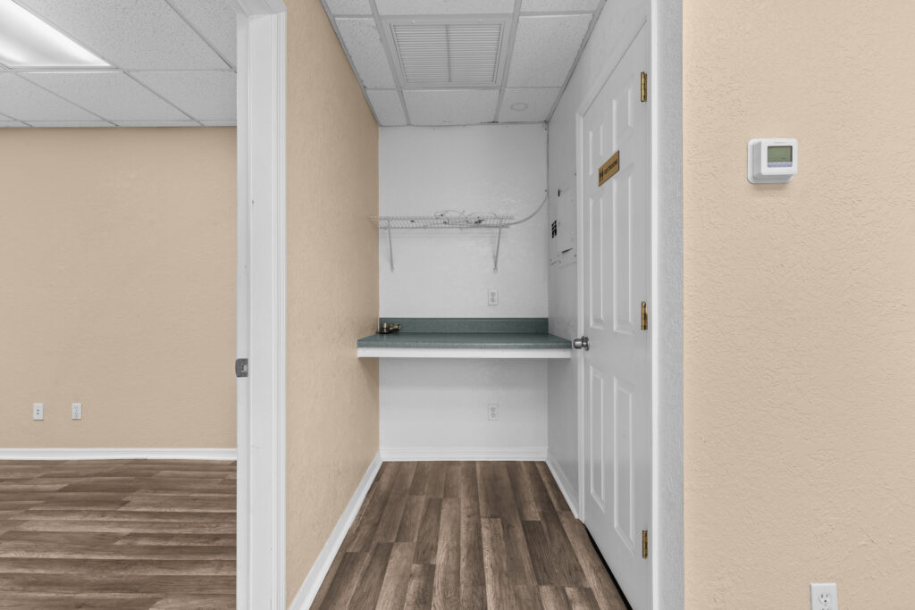 Photo of a commercial space for rent in Merritt Island, Florida at 2460 North Courtenay Parkway in 103 in Merritt Island, Florida. Call Perrone Properties at 321-454-3393 for more information unit 103 at Perrone Plaza.