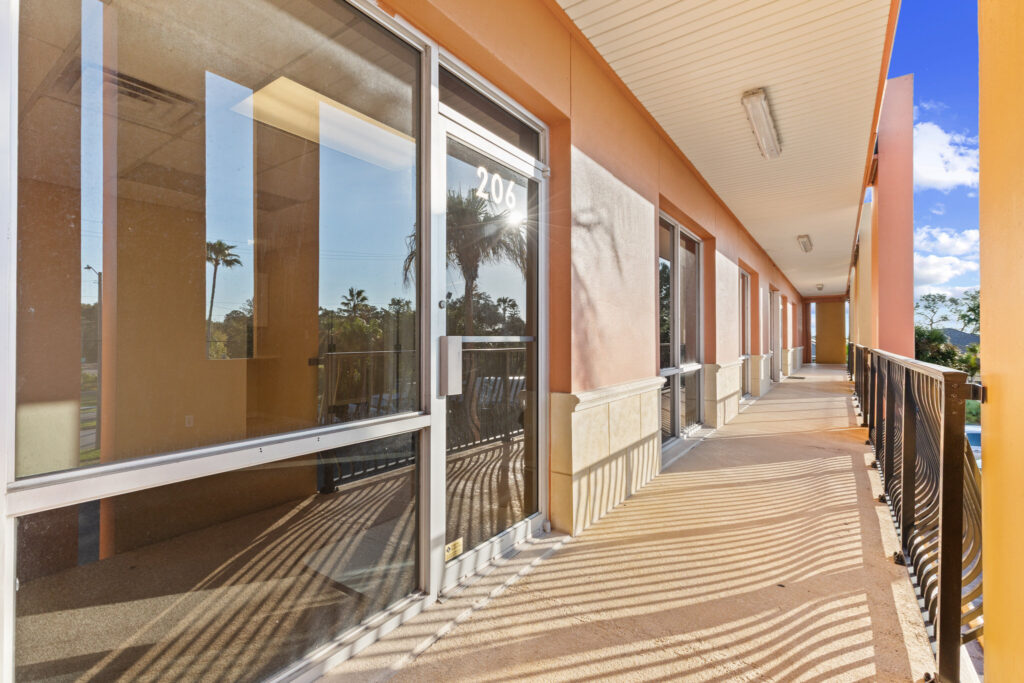 Photo of a commercial space for rent in Merritt Island, Florida at 2460 North Courtenay Parkway in 206 in Merritt Island, Florida. Call Perrone Properties at 321-454-3393 for more information unit 206 at Perrone Plaza.