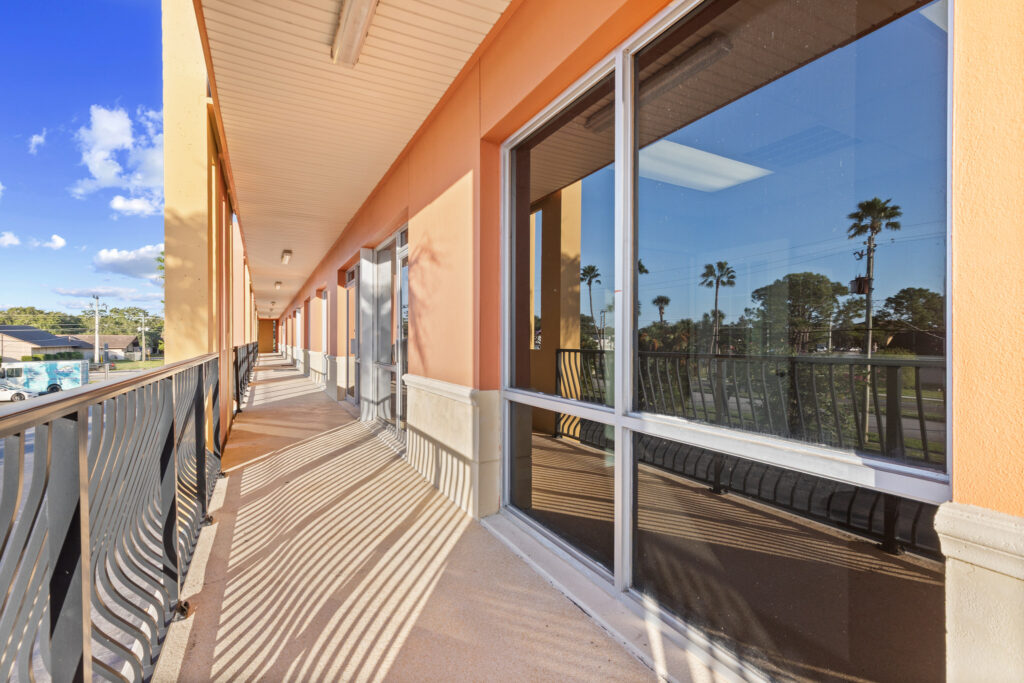 Photo of a commercial space for rent in Merritt Island, Florida at 2460 North Courtenay Parkway in 206 in Merritt Island, Florida. Call Perrone Properties at 321-454-3393 for more information unit 206 at Perrone Plaza.