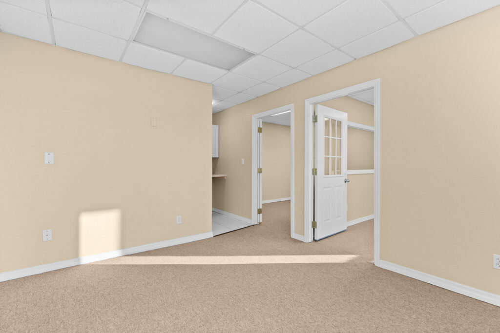 Photo of a commercial space for rent in Merritt Island, Florida at 2460 North Courtenay Parkway in 206 in Merritt Island, Florida. Call Perrone Properties at 321-454-3393 for more information unit 206 at Perrone Plaza.