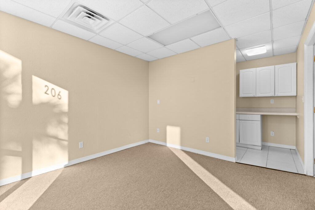 Photo of a commercial space for rent in Merritt Island, Florida at 2460 North Courtenay Parkway in 206 in Merritt Island, Florida. Call Perrone Properties at 321-454-3393 for more information unit 206 at Perrone Plaza.