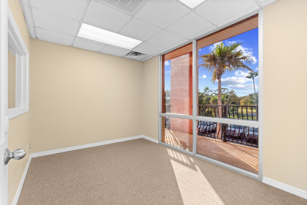 Photo of a commercial space for rent in Merritt Island, Florida at 2460 North Courtenay Parkway in 206 in Merritt Island, Florida. Call Perrone Properties at 321-454-3393 for more information unit 206 at Perrone Plaza.