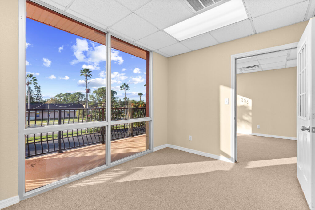 Photo of a commercial space for rent in Merritt Island, Florida at 2460 North Courtenay Parkway in 206 in Merritt Island, Florida. Call Perrone Properties at 321-454-3393 for more information unit 206 at Perrone Plaza.