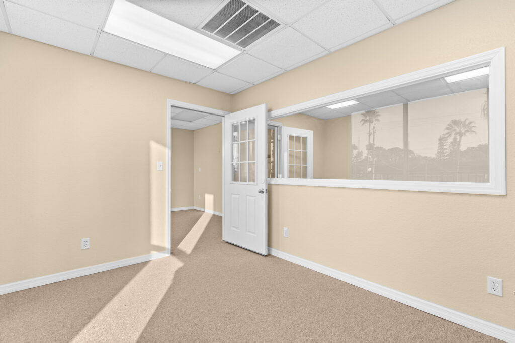 Photo of a commercial space for rent in Merritt Island, Florida at 2460 North Courtenay Parkway in 206 in Merritt Island, Florida. Call Perrone Properties at 321-454-3393 for more information unit 206 at Perrone Plaza.