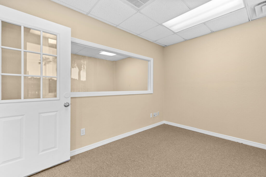 Photo of a commercial space for rent in Merritt Island, Florida at 2460 North Courtenay Parkway in 206 in Merritt Island, Florida. Call Perrone Properties at 321-454-3393 for more information unit 206 at Perrone Plaza.
