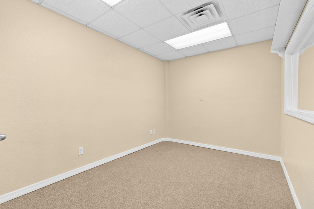 Photo of a commercial space for rent in Merritt Island, Florida at 2460 North Courtenay Parkway in 206 in Merritt Island, Florida. Call Perrone Properties at 321-454-3393 for more information unit 206 at Perrone Plaza.