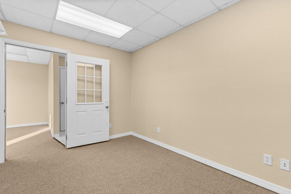 Photo of a commercial space for rent in Merritt Island, Florida at 2460 North Courtenay Parkway in 206 in Merritt Island, Florida. Call Perrone Properties at 321-454-3393 for more information unit 206 at Perrone Plaza.