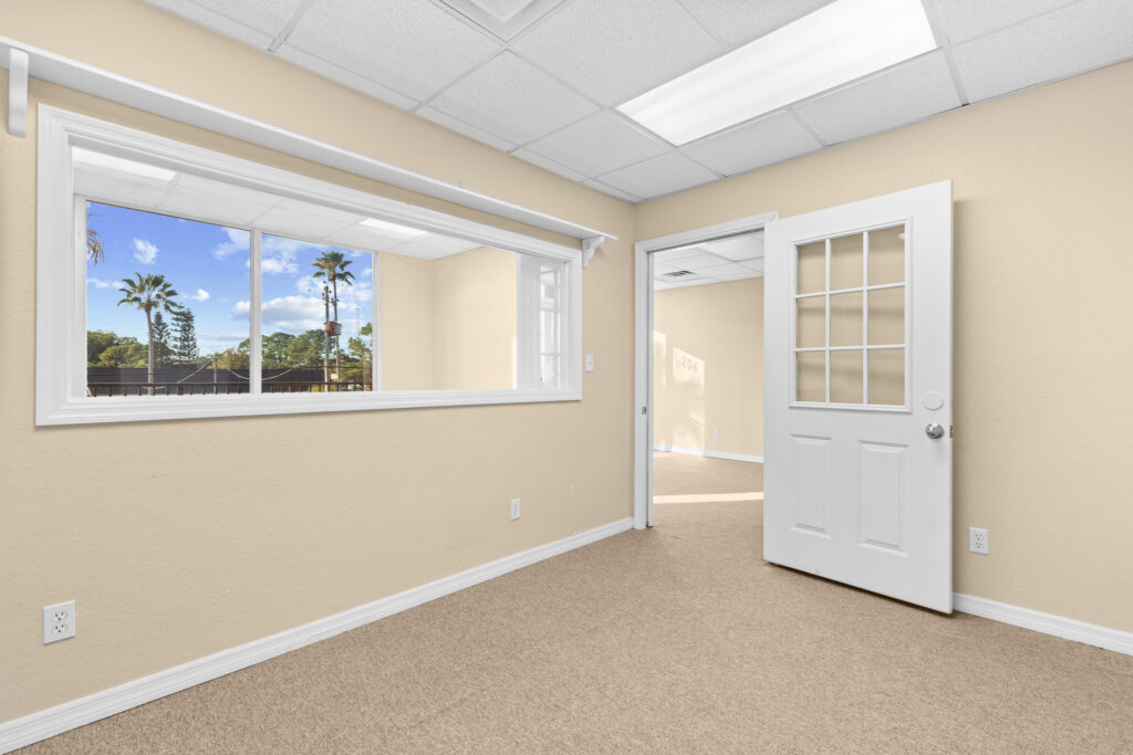 Photo of a commercial space for rent in Merritt Island, Florida at 2460 North Courtenay Parkway in 206 in Merritt Island, Florida. Call Perrone Properties at 321-454-3393 for more information unit 206 at Perrone Plaza.