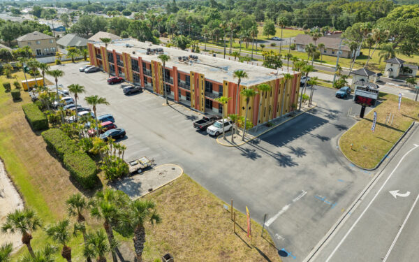 An aerial view of the Perrone Plaza building located at 2460 North Courtney Parkway in Merritt Island, Florida.