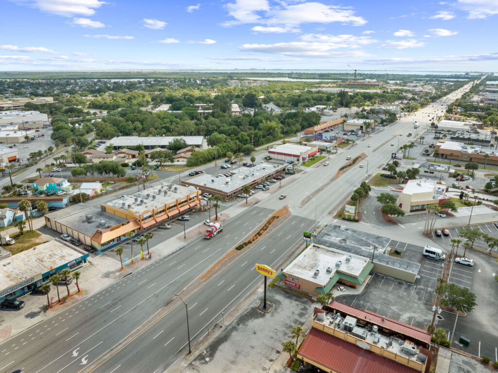 An aerial view of the Perrone Twin Rivers, 76 E. Merritt Island Causeway looking towards Cocoa Beach and Port Canaveral.